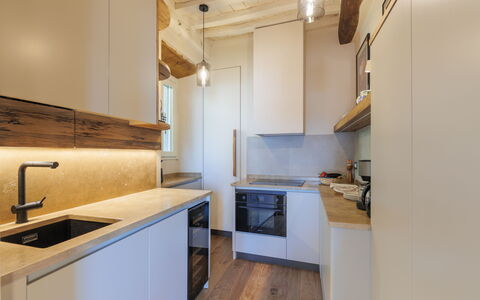 Casa Novecento: Cabinetry, Countertop, Kitchen Sink, Wood, Sink, Kitchen Appliance, Flooring, Kitchen Stove, Kitchen, Floor
