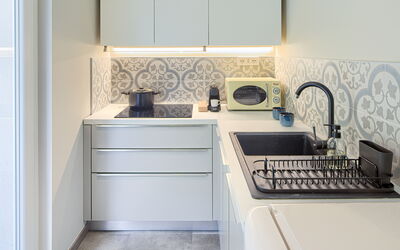 Magnolia - Ground Floor Apartment: Kitchen Sink, Cabinetry, Countertop, Property, Tap, Sink, Plumbing Fixture, Kitchen, Kitchen Stove, Wood