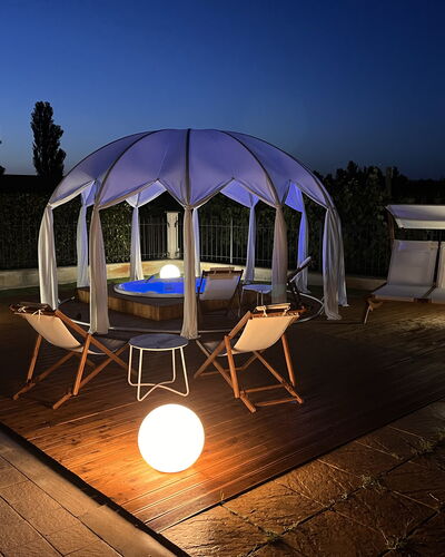 Villa Castelnuovo: Sky, Furniture, Building, Light, Table, Lighting, Outdoor Furniture, Shade, Chair, Tent