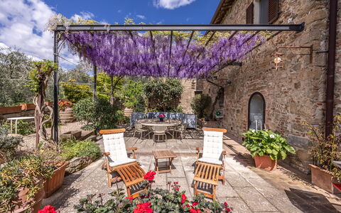 Monticchiello Apartment With Garden, Wifi, Pienza,: Flower, Plant, Cloud, Sky, Furniture, Building, Window, Chair, Purple, Table