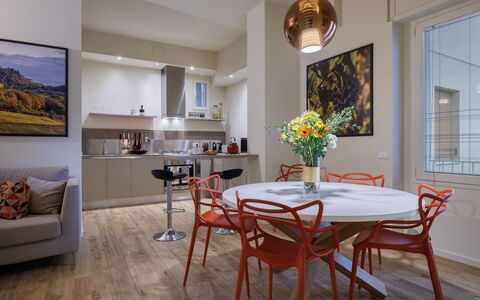 Betty Florence Charming Modern Apartment Near Piaz: Table, Furniture, Property, Picture Frame, Window, Chair, Wood, Interior Design, Lighting, Orange