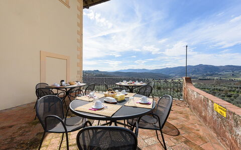 Villa Badiuzza: Table, Cloud, Sky, Furniture, Property, Building, Chair, Wood, Outdoor Table, Outdoor Furniture