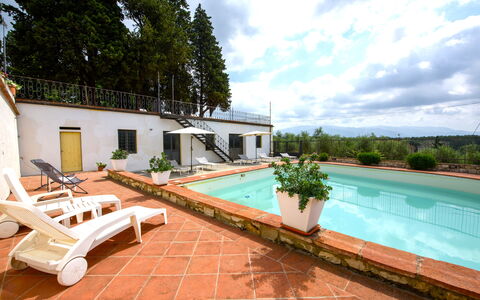 Villa Badiuzza: Water, Plant, Sky, Cloud, Swimming Pool, Window, Azure, Building, Tree, Outdoor Furniture