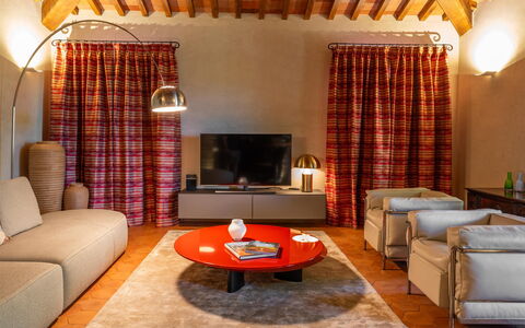 Villa Bartolomeo: Furniture, Property, Table, Building, Couch, Comfort, Decoration, Orange, Wood, Living Room