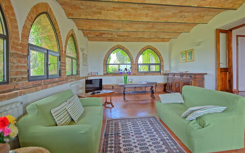 Maggiano: Couch, Furniture, Property, Table, Green, Window, Picture Frame, Living Room, Plant, Interior Design