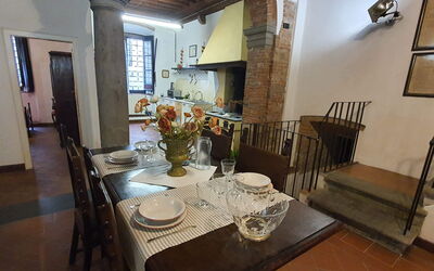 La Colonna: Table, Picture Frame, Furniture, Tableware, Chair, Building, Wood, Lighting, Dishware, Interior Design