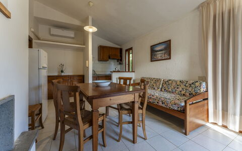 Giannella Apartment - Orbetello, Toscana: Furniture, Table, Azure, Wood, Chair, Flooring, Floor, Building, Hardwood, Curtain