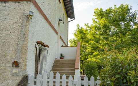 Podere Vallino: Cloud, Sky, Property, Plant, Building, Wood, Tree, Fence, Road Surface, House