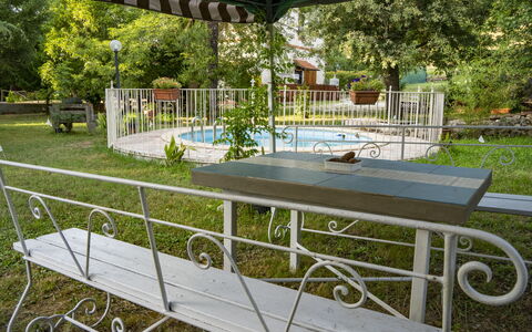 Podere Vallino: Plant, Outdoor Bench, Shade, Tree, Outdoor Furniture, Building, Urban Design, Leisure, Grass, Real Estate