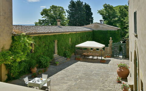 Torre Di Montelopio: Plant, Sky, Property, Building, Tree, Cloud, Shade, Flowerpot, Land Lot, Houseplant