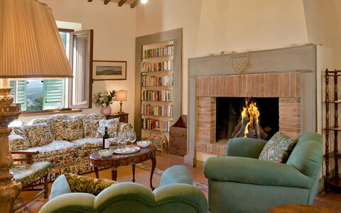 Torre Di Montelopio: Property, Furniture, Plant, Table, Couch, Picture Frame, Living Room, Lighting, Wood, Interior Design