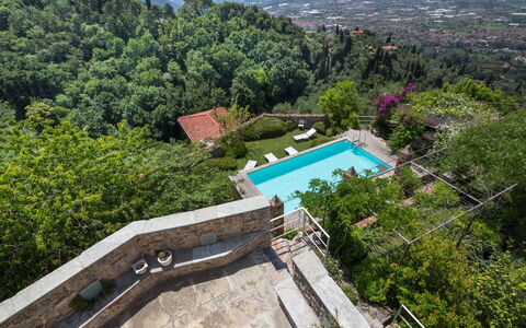 Villa Maestosa - Camaiore, Toscana: Property, Water, Plant, Swimming Pool, Tree, Building, Urban Design, Leisure, Landscape, Residential Area