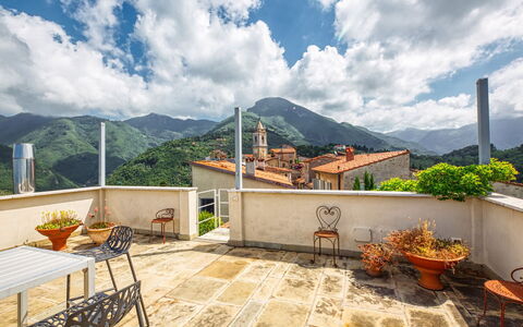 Villa Maestosa - Camaiore, Toscana: Cloud, Sky, Building, Property, Furniture, Flowerpot, Mountain, Houseplant, Outdoor Furniture, Chair