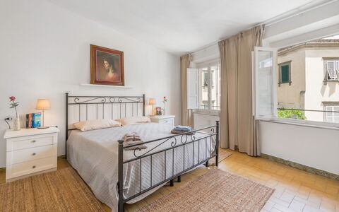 Lucca Old Town Apartment - Lucca, Toscana: Property, Furniture, Cabinetry, Window, Comfort, Wood, Bed Frame, Interior Design, Flooring, Floor