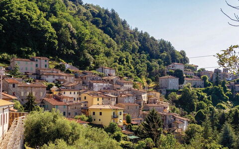 Casa Iris - Versilia, Holiday Home with Pool: Sky, Building, Plant, Mountain, Natural Landscape, Tree, Window, Highland, House, Neighbourhood