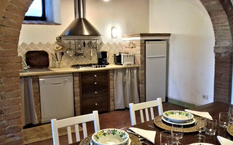 Casa Le Crete: Table, Furniture, Cabinetry, Property, Countertop, Chair, Wood, Interior Design, Kitchen, Living Room