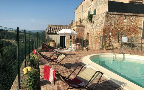 Casa Le Crete: Water, Sky, Property, Plant, Building, Window, Swimming Pool, Chair, Outdoor Furniture, Shade