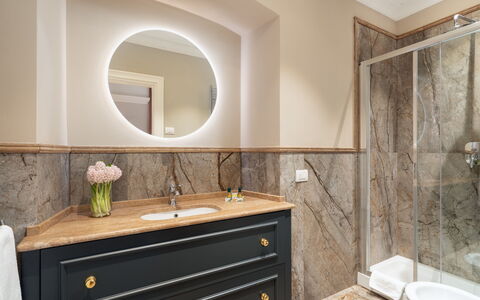 Pazzi Penthouse Luxury Apartment in Florence by Pa: Mirror, Tap, Bathroom Cabinet, Cabinetry, Property, Plumbing Fixture, Building, Bathroom Sink, Sink, Bathroom