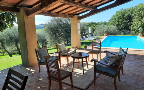 Villa San Giovanni: Property, Furniture, Plant, Sky, Green, Chair, Shade, Table, Interior Design, Outdoor Furniture