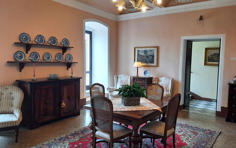 Villa Delle Palme: Furniture, Table, Picture Frame, Wood, Lighting, Interior Design, Chair, Floor, Living Room, Cabinetry