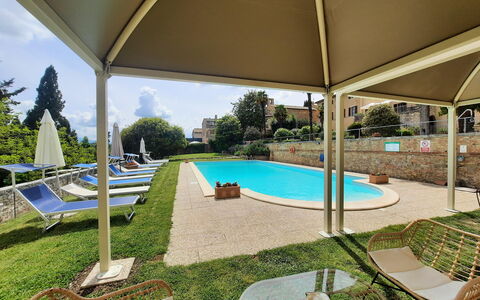 Villa Delle Palme: Water, Property, Plant, Sky, Swimming Pool, Shade, Building, Outdoor Furniture, Architecture, Tree