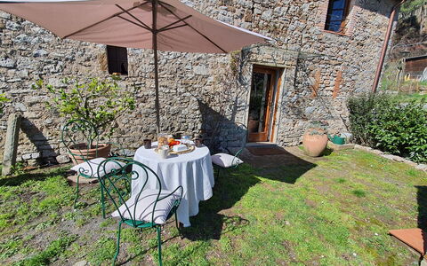 Il Cantuccio: Plant, Property, Table, Furniture, Chair, Building, Tableware, Outdoor Table, Tablecloth, Interior Design