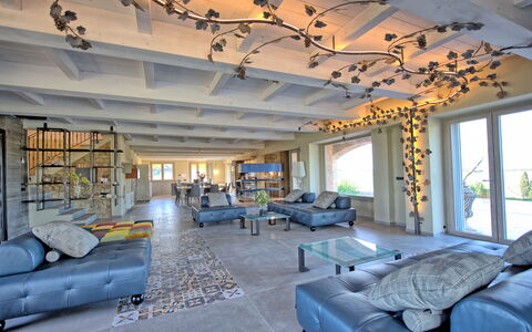 Villa Campana: Property, Furniture, Couch, Window, Picture Frame, Interior Design, Table, Architecture, Bookcase, Living Room