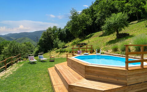 Villa Dei Tigli: Water, Plant, Sky, Swimming Pool, Tree, Cloud, Outdoor Furniture, Building, Natural Landscape, Shade