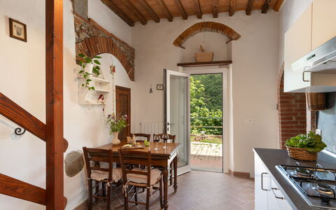 Villa Dei Tigli: Furniture, Table, Property, Plant, Houseplant, Wood, Interior Design, Flowerpot, Cabinetry, Chair