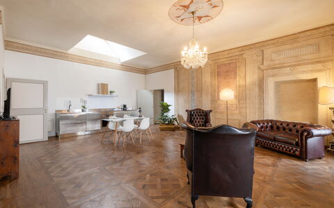 Appartamento Reale: Table, Furniture, Wood, Lighting, Hall, Interior Design, Building, Cabinetry, Flooring, Floor