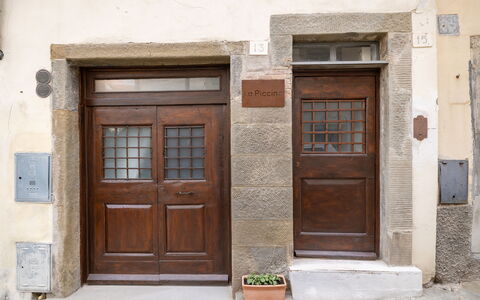 La Piccina: Brown, Door, Building, Wood, Plant, Home Door, Window, Brick, House