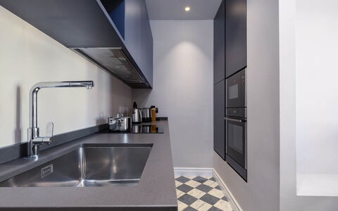 Torretta Penthouse Luxury Apartment In Florence By: Kitchen, Countertop, Kitchen Appliance, Interior Design, Major Appliance, Cabinetry, Kitchen Stove, Flooring, Sink, Home Appliance