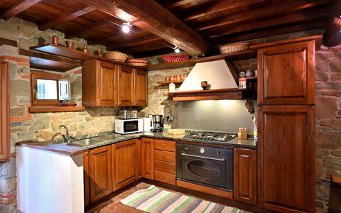 Villa Sette Ponti Levante: Countertop, Cabinetry, Property, Kitchen Appliance, Kitchen, Kitchen Stove, Wood, Drawer, Interior Design, Home Appliance