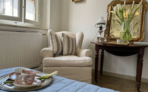 Piazza S. Romano: Furniture, Property, Table, Window, Comfort, Wood, Textile, Picture Frame, Tableware, Chair