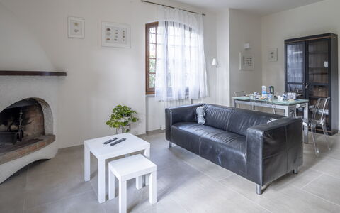 Dimora Del Capitano: Couch, Furniture, Table, Interior Design, Living Room, Studio Couch, Houseplant, Picture Frame, Comfort, Plant