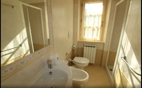 Villa Carducci: Mirror, Sink, Plumbing Fixture, Tap, Bathroom Sink, Window, Bathroom, Wood, Interior Design, Floor