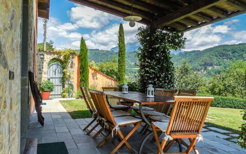 Villa Gelsomino: Plant, Sky, Furniture, Cloud, Property, Leaf, Azure, Table, Wood, Shade
