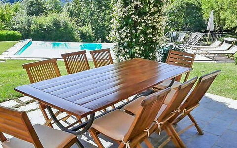 Villa Gelsomino: Table, Furniture, Green, Chair, Outdoor Table, Wood, Tree, Outdoor Furniture, Rectangle, Shade