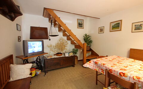 Casa Le Grotte: Furniture, Table, Picture Frame, Wood, Architecture, Houseplant, Plant, Comfort, Floor, Building