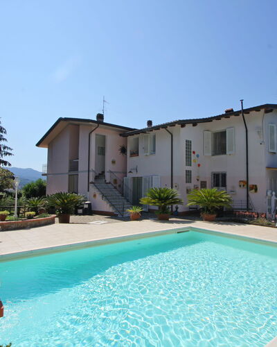 Casa Luigi: Water, Plant, Sky, Property, Building, Swimming Pool, Azure, Grass, Tree, Leisure