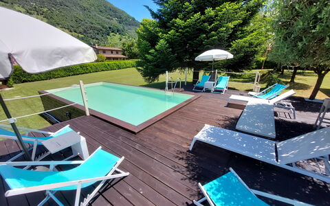 Villa L'antico Casale: Property, Furniture, Water, Umbrella, Swimming Pool, Sky, Green, Blue, Azure, Shade
