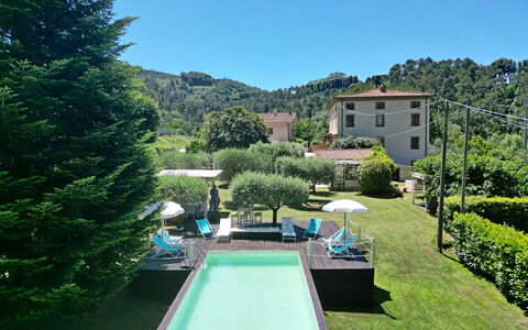 Villa L'antico Casale: Plant, Sky, Property, Building, Water, Tree, Natural Landscape, Grass, Urban Design, Biome