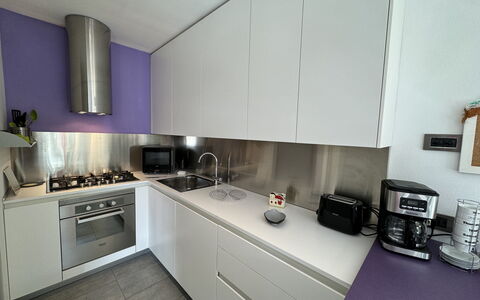 Galleria Degli Artisti: Countertop, Cabinetry, Kitchen Stove, Kitchen, Kitchen Appliance, Gas Stove, Stove, Flooring, Home Appliance