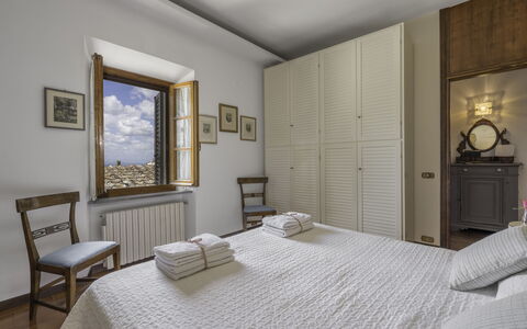 Casa Martina, Piazza Delle Erbe, San Gimignano: Furniture, Interior Design, Bedroom, Bed, Flooring, Floor, Ceiling, Lighting, Room, Bedding
