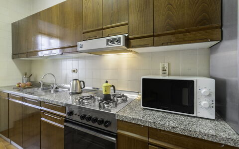 Casa Martina, Piazza Delle Erbe, San Gimignano: Kitchen Appliance, Kitchen, Countertop, Kitchen Stove, Major Appliance, Cabinetry, Home Appliance, Stove, Gas Stove, Flooring