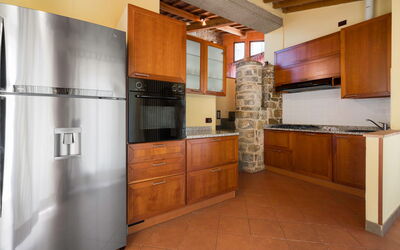 Torre 3: Kitchen, Kitchen Appliance, Major Appliance, Flooring, Wood, Cabinetry, Countertop, Interior Design, Furniture, Floor