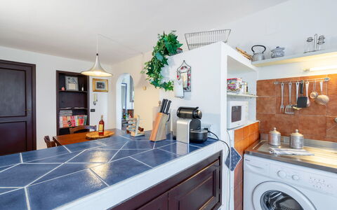 Chianti Hills Apartment, Pool, Ac: Cabinetry, Furniture, Countertop, Home Appliance, Plant, Kitchen, Azure, Picture Frame, Wood, Kitchen Appliance