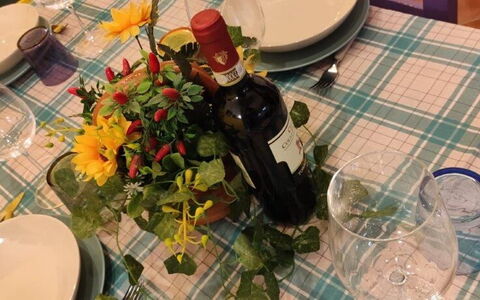 Bocelli: Flower, Tableware, Table, Plant, Bottle, Drinkware, Petal, Tablecloth, Vase, Wine