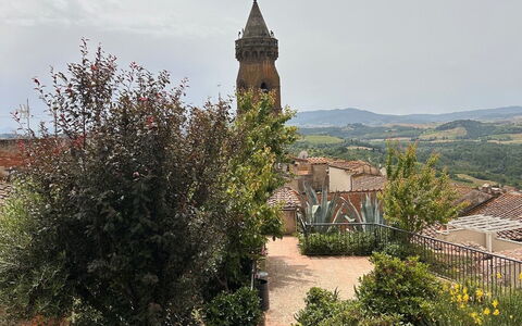 Bocelli: Sky, Plant, Building, Cloud, Tree, Landscape, City, Roof, Facade, Shrub