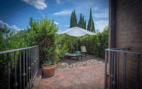 Torri 15 Holiday Home: Cloud, Sky, Plant, Property, Botany, Flowerpot, Chair, Shade, Real Estate, Grass